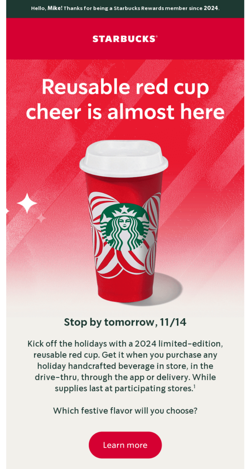 Starbucks Christmas email promoting reusable red cups with festive red and white designs, spreading holiday cheer.